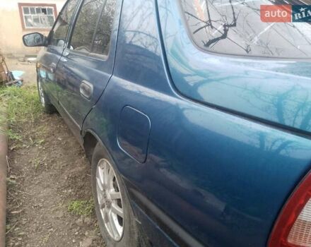 Синий Ниссан Санни, объемом двигателя 1.39 л и пробегом 325 тыс. км за 1350 $, фото 7 на Automoto.ua