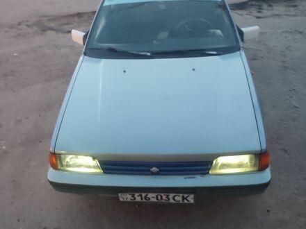 Синій Ніссан Санні, об'ємом двигуна 7 л та пробігом 600 тис. км за 708 $, фото 1 на Automoto.ua