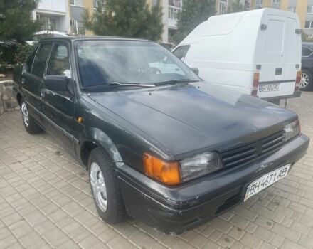 Зеленый Ниссан Санни, объемом двигателя 1.6 л и пробегом 288 тыс. км за 880 $, фото 1 на Automoto.ua