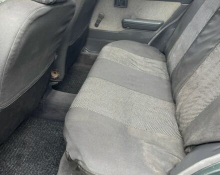 Зеленый Ниссан Санни, объемом двигателя 1.6 л и пробегом 288 тыс. км за 880 $, фото 6 на Automoto.ua