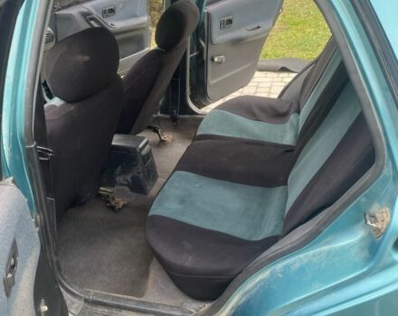 Зеленый Ниссан Санни, объемом двигателя 1.4 л и пробегом 580 тыс. км за 1250 $, фото 6 на Automoto.ua