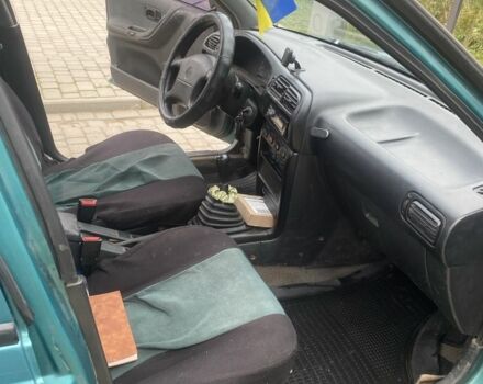 Зеленый Ниссан Санни, объемом двигателя 1.4 л и пробегом 580 тыс. км за 1250 $, фото 5 на Automoto.ua