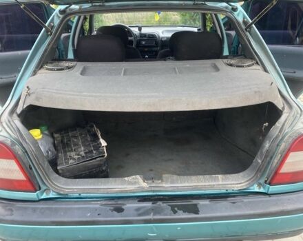 Зеленый Ниссан Санни, объемом двигателя 1.4 л и пробегом 580 тыс. км за 1250 $, фото 7 на Automoto.ua