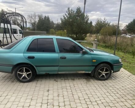 Зеленый Ниссан Санни, объемом двигателя 1.4 л и пробегом 580 тыс. км за 1250 $, фото 2 на Automoto.ua