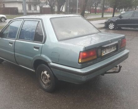 Зеленый Ниссан Санни, объемом двигателя 1.7 л и пробегом 300 тыс. км за 758 $, фото 1 на Automoto.ua