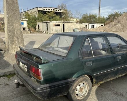 Зелений Ніссан Санні, об'ємом двигуна 1.4 л та пробігом 400 тис. км за 850 $, фото 2 на Automoto.ua