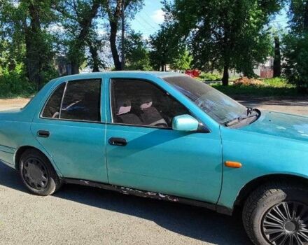 Зеленый Ниссан Санни, объемом двигателя 1.6 л и пробегом 226 тыс. км за 1100 $, фото 9 на Automoto.ua