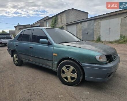 Зеленый Ниссан Санни, объемом двигателя 1.6 л и пробегом 377 тыс. км за 400 $, фото 1 на Automoto.ua