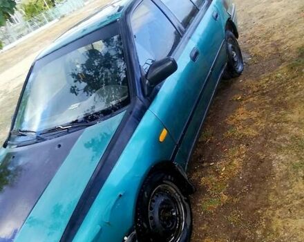 Зелений Ніссан Санні, об'ємом двигуна 1.4 л та пробігом 380 тис. км за 1100 $, фото 7 на Automoto.ua