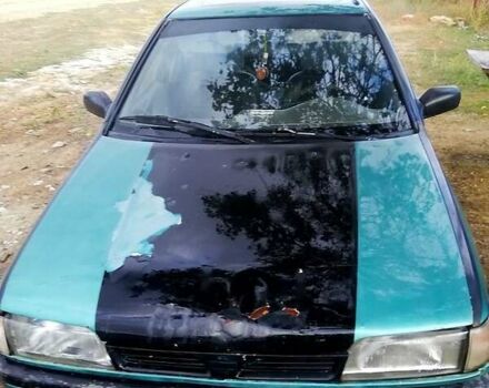 Зелений Ніссан Санні, об'ємом двигуна 1.4 л та пробігом 380 тис. км за 1100 $, фото 8 на Automoto.ua