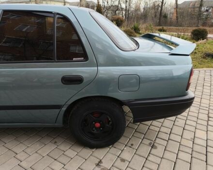 Зелений Ніссан Санні, об'ємом двигуна 1.4 л та пробігом 444 тис. км за 1649 $, фото 14 на Automoto.ua