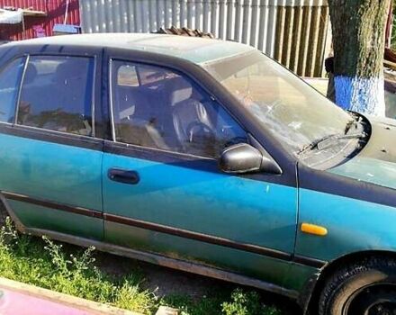 Зелений Ніссан Санні, об'ємом двигуна 1.4 л та пробігом 380 тис. км за 1100 $, фото 1 на Automoto.ua