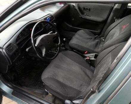 Зелений Ніссан Санні, об'ємом двигуна 1.4 л та пробігом 444 тис. км за 1649 $, фото 22 на Automoto.ua