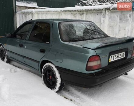 Зеленый Ниссан Санни, объемом двигателя 1.4 л и пробегом 444 тыс. км за 1300 $, фото 5 на Automoto.ua