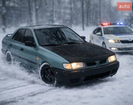 Зеленый Ниссан Санни, объемом двигателя 1.4 л и пробегом 444 тыс. км за 1300 $, фото 18 на Automoto.ua