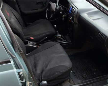 Зелений Ніссан Санні, об'ємом двигуна 1.4 л та пробігом 333 тис. км за 1644 $, фото 7 на Automoto.ua