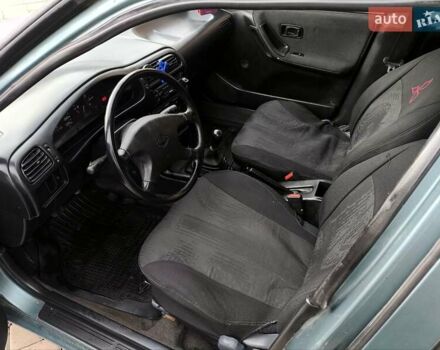 Зелений Ніссан Санні, об'ємом двигуна 1.4 л та пробігом 333 тис. км за 1644 $, фото 24 на Automoto.ua