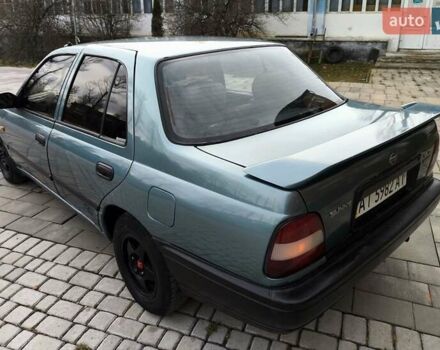 Зелений Ніссан Санні, об'ємом двигуна 1.4 л та пробігом 333 тис. км за 1644 $, фото 3 на Automoto.ua