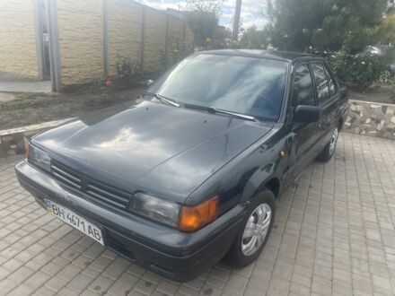 Зеленый Ниссан Санни, объемом двигателя 1.6 л и пробегом 288 тыс. км за 880 $, фото 1 на Automoto.ua