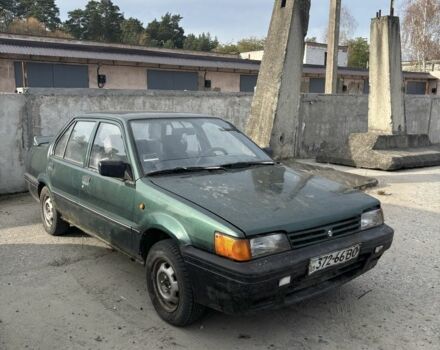 Зеленый Ниссан Санни, объемом двигателя 1.4 л и пробегом 400 тыс. км за 850 $, фото 1 на Automoto.ua