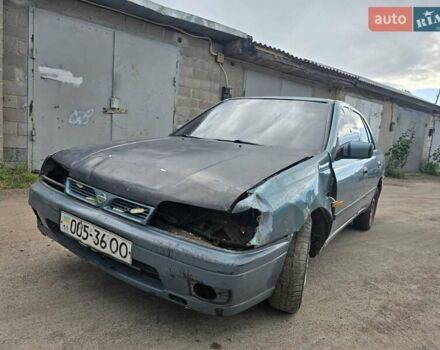 Зеленый Ниссан Санни, объемом двигателя 1.6 л и пробегом 377 тыс. км за 400 $, фото 1 на Automoto.ua