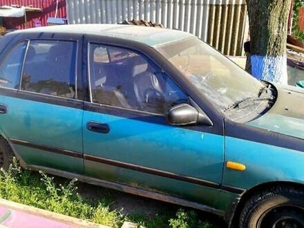 Зелений Ніссан Санні, об'ємом двигуна 1.4 л та пробігом 380 тис. км за 1100 $, фото 1 на Automoto.ua