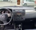 Белый Ниссан Тиида, объемом двигателя 1.46 л и пробегом 210 тыс. км за 3999 $, фото 27 на Automoto.ua