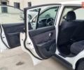 Белый Ниссан Тиида, объемом двигателя 1.46 л и пробегом 210 тыс. км за 3999 $, фото 23 на Automoto.ua
