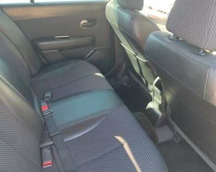 Белый Ниссан Тиида, объемом двигателя 1.5 л и пробегом 65 тыс. км за 8500 $, фото 11 на Automoto.ua