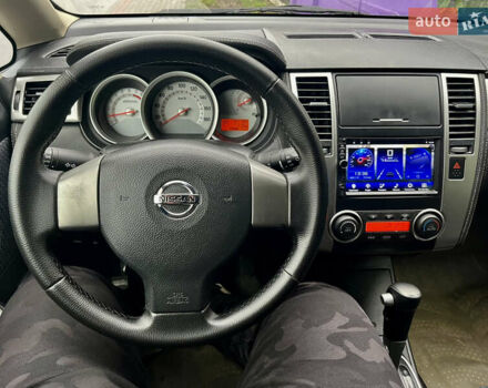 Белый Ниссан Тиида, объемом двигателя 1.5 л и пробегом 91 тыс. км за 7499 $, фото 26 на Automoto.ua