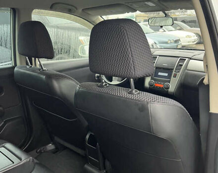 Белый Ниссан Тиида, объемом двигателя 1.5 л и пробегом 91 тыс. км за 7499 $, фото 42 на Automoto.ua