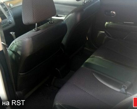 Белый Ниссан Тиида, объемом двигателя 1.5 л и пробегом 151 тыс. км за 7200 $, фото 3 на Automoto.ua