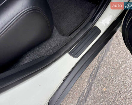 Белый Ниссан Тиида, объемом двигателя 1.5 л и пробегом 91 тыс. км за 7499 $, фото 39 на Automoto.ua