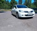 Белый Ниссан Тиида, объемом двигателя 1.5 л и пробегом 96 тыс. км за 7199 $, фото 1 на Automoto.ua