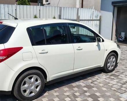 Белый Ниссан Тиида, объемом двигателя 1.5 л и пробегом 159 тыс. км за 8199 $, фото 1 на Automoto.ua