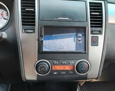 Белый Ниссан Тиида, объемом двигателя 1.5 л и пробегом 159 тыс. км за 8199 $, фото 8 на Automoto.ua