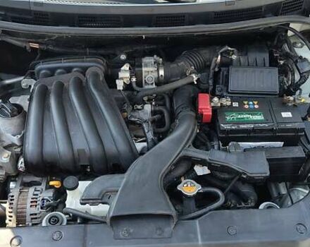 Белый Ниссан Тиида, объемом двигателя 1.5 л и пробегом 159 тыс. км за 8199 $, фото 9 на Automoto.ua