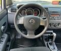 Білий Ніссан Тііда, об'ємом двигуна 1.6 л та пробігом 83 тис. км за 8900 $, фото 26 на Automoto.ua