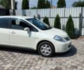 Белый Ниссан Тиида, объемом двигателя 1.5 л и пробегом 159 тыс. км за 8199 $, фото 1 на Automoto.ua