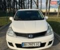 Белый Ниссан Тиида, объемом двигателя 1.6 л и пробегом 155 тыс. км за 8200 $, фото 1 на Automoto.ua