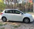 Белый Ниссан Тиида, объемом двигателя 1.6 л и пробегом 146 тыс. км за 7000 $, фото 1 на Automoto.ua