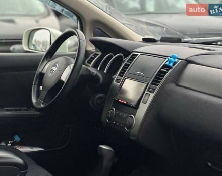 Белый Ниссан Тиида, объемом двигателя 1.5 л и пробегом 107 тыс. км за 7990 $, фото 12 на Automoto.ua