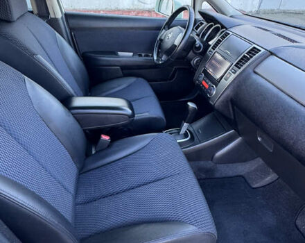 Белый Ниссан Тиида, объемом двигателя 1.5 л и пробегом 35 тыс. км за 8400 $, фото 10 на Automoto.ua