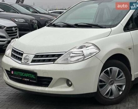 Белый Ниссан Тиида, объемом двигателя 1.5 л и пробегом 107 тыс. км за 7990 $, фото 2 на Automoto.ua