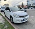 Белый Ниссан Тиида, объемом двигателя 1.6 л и пробегом 100 тыс. км за 9600 $, фото 1 на Automoto.ua