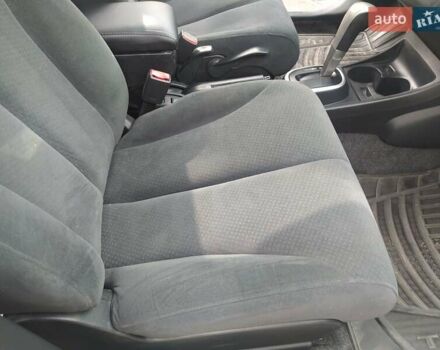 Белый Ниссан Тиида, объемом двигателя 1.6 л и пробегом 142 тыс. км за 6900 $, фото 25 на Automoto.ua