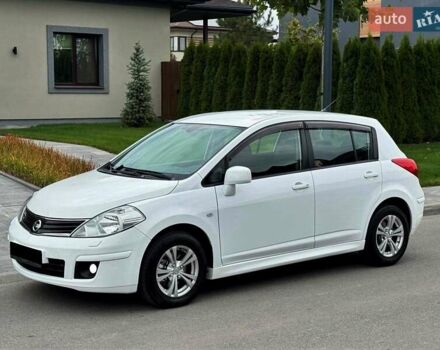 Белый Ниссан Тиида, объемом двигателя 1.6 л и пробегом 75 тыс. км за 8500 $, фото 3 на Automoto.ua