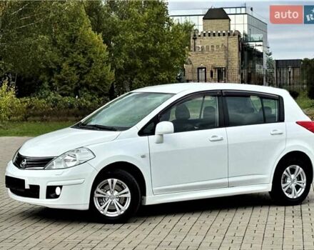 Белый Ниссан Тиида, объемом двигателя 1.6 л и пробегом 74 тыс. км за 8500 $, фото 2 на Automoto.ua