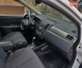 Белый Ниссан Тиида, объемом двигателя 1.6 л и пробегом 75 тыс. км за 8500 $, фото 9 на Automoto.ua