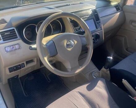 Белый Ниссан Тиида, объемом двигателя 1.6 л и пробегом 190 тыс. км за 4999 $, фото 19 на Automoto.ua